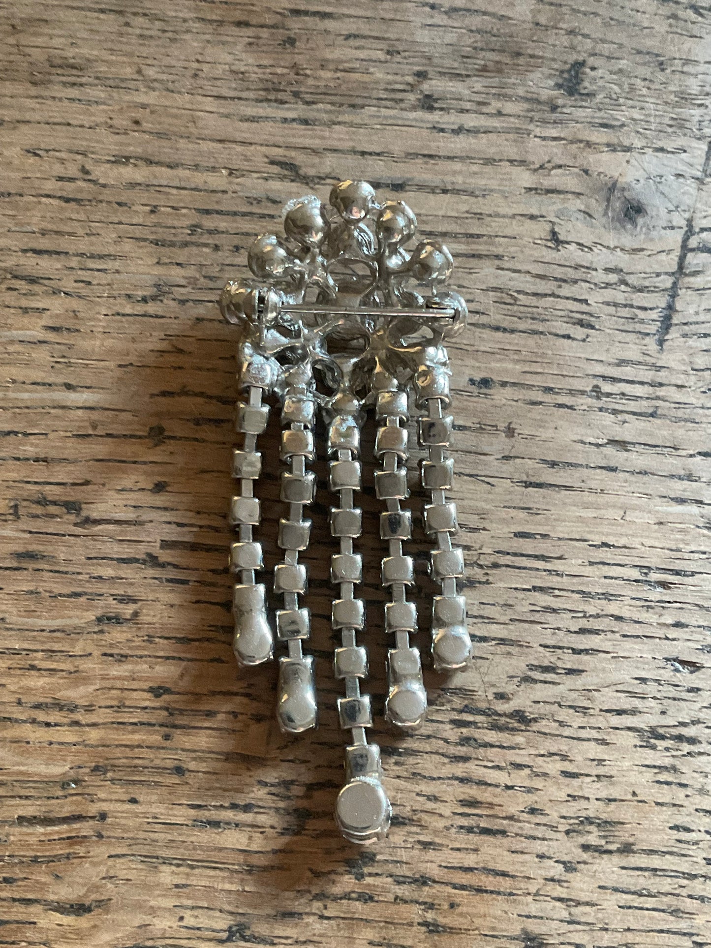 Diamanté waterfall brooch